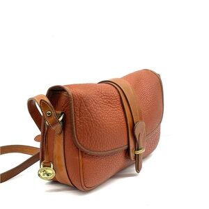 Dooney & Bourke Orange Pebbled Leather Crossbody with Buckle Strap